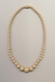 Vintage necklace made of plastic imitation ivory beads and fastener, length 16'' 40cm.